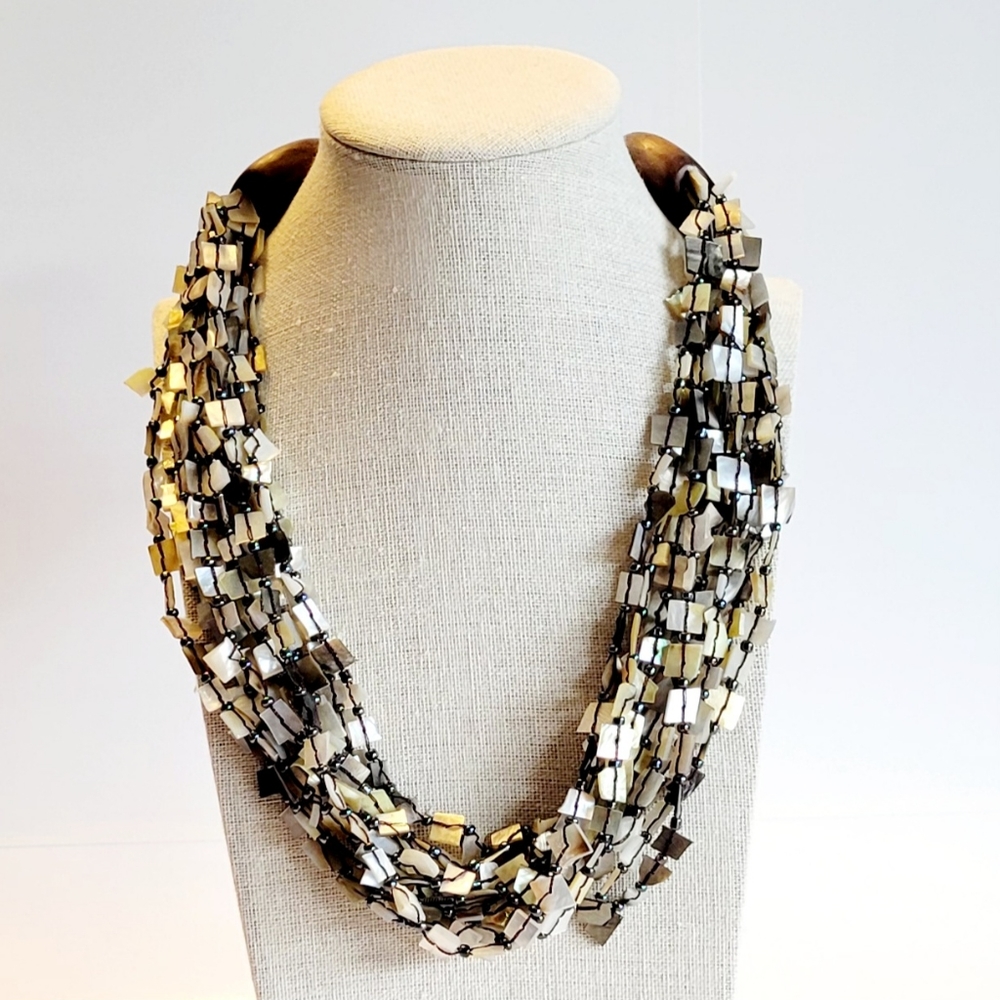 Statement Neclace, Artsy 12 strand mother of pearl with wood and button clasp.